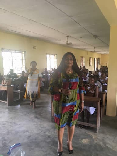 Mrs. Dominic Ukpong and the students of her adopted school during one of her visits to the school