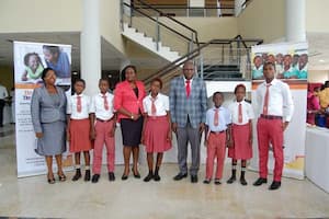 Students of Nsit People Grammer School Afaha Offiong, Nsit Ibom LGA and their mentor Charles Henry (4th right)