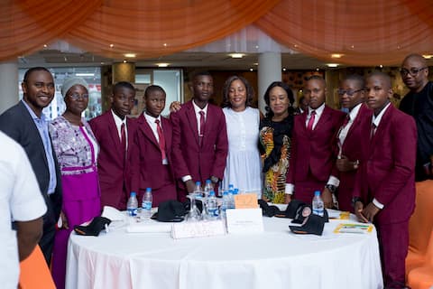 Mentor Modupe Bankole and the Guest speaker, Mrs Ini Abimbola and the student of her adopted school